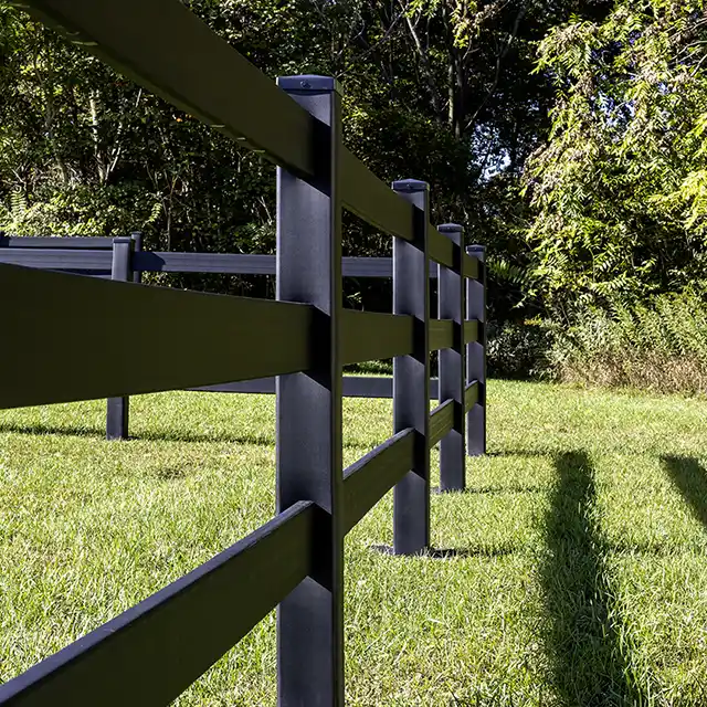 Dark Horse black composite post and rail fencing installation showing warp-resistant straight alignment